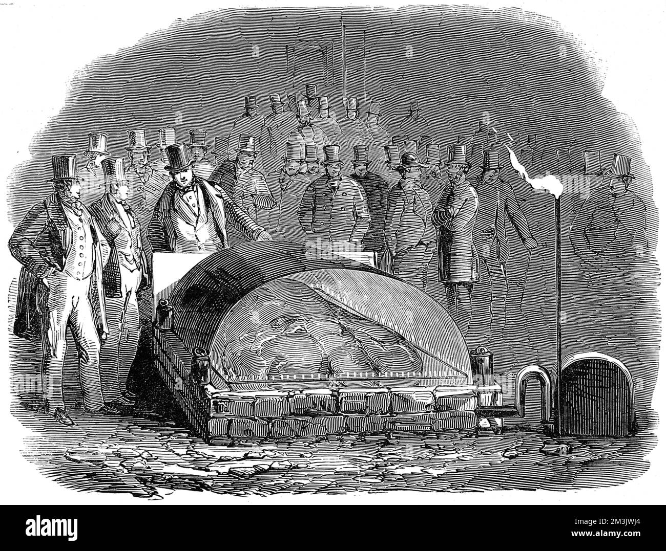 Scène de la douzième réunion annuelle et exposition de la Royal Agricultural Society en 1850 montrant un « baron » (sirloin et rumed des deux côtés) de boeuf rôti au gaz, et supervisé par le célèbre chef Alexis Soyer. SOYER, un célèbre chef parisien, est venu en Angleterre en 1831, gagnant en popularité en travaillant pour un certain nombre d'aristocrates avant de trouver la renommée comme chef du Club de réforme. SOYER est surtout connu pour son travail philanthropique et ses inventions domestiques efficaces, notamment pour l'introduction de la cuisine à soupe dans les zones pauvres (en particulier l'Irlande pendant la famine) et pour la fourniture de nu Banque D'Images