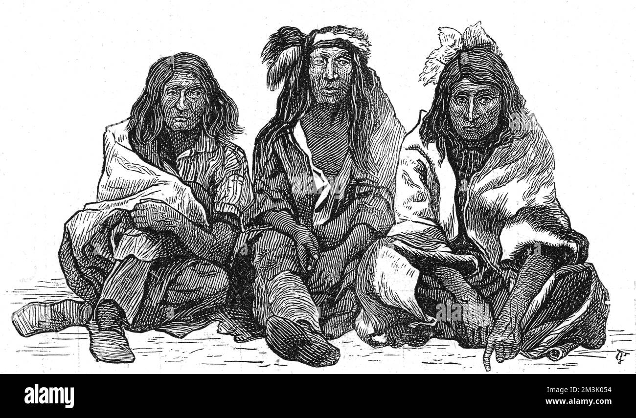 Un groupe d'Indiens Cris portant des châles et des plumes dans leurs cheveux de la région de Winnipeg. Date: 1874 Banque D'Images