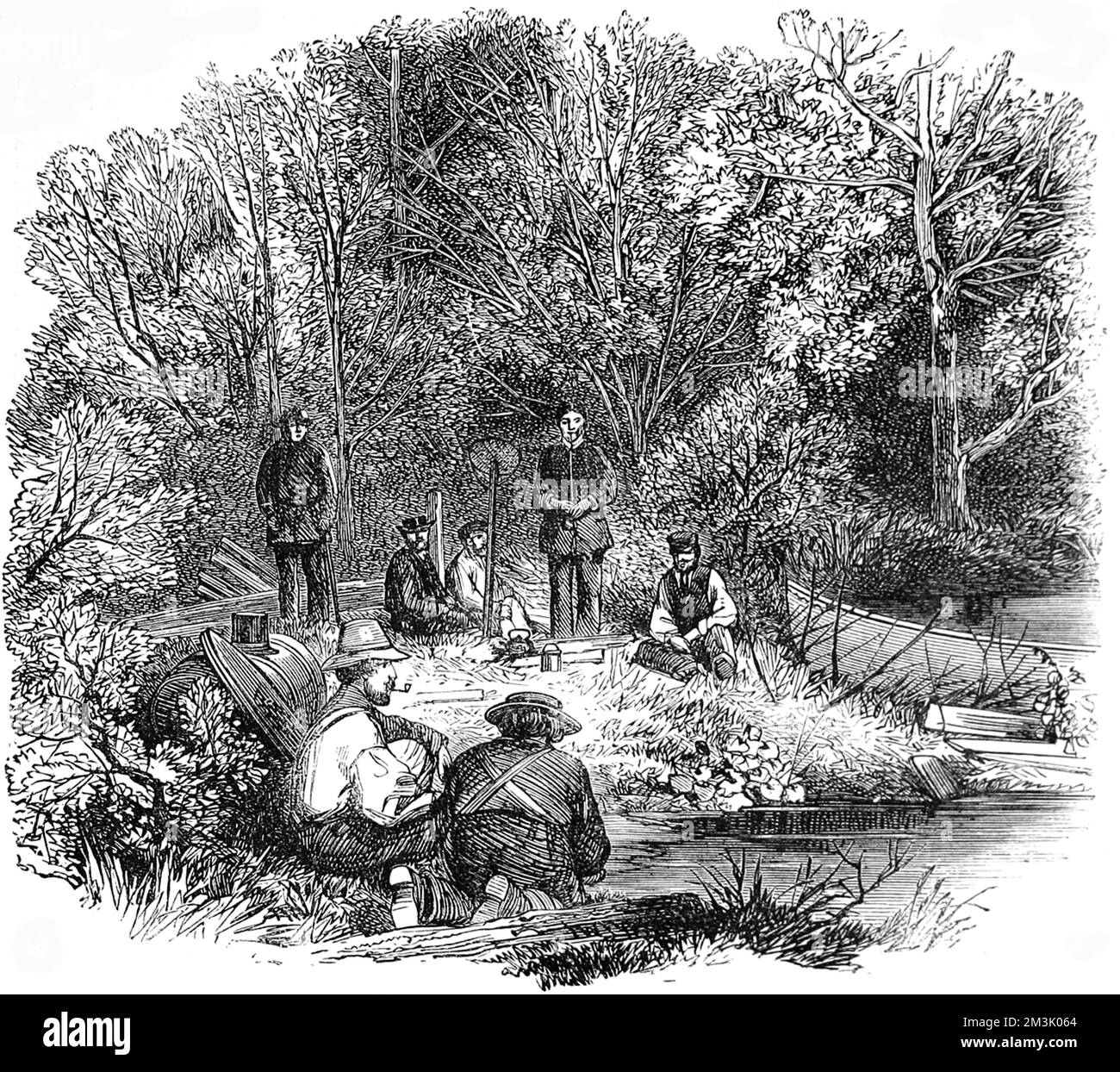 Le chef des Indiens Passamaquoddy divertit ses invités anglais en leur racontant des histoires sur l'histoire de sa tribu dans un camp boisé sur la rive du lac Utopia. Date: 1863 Banque D'Images