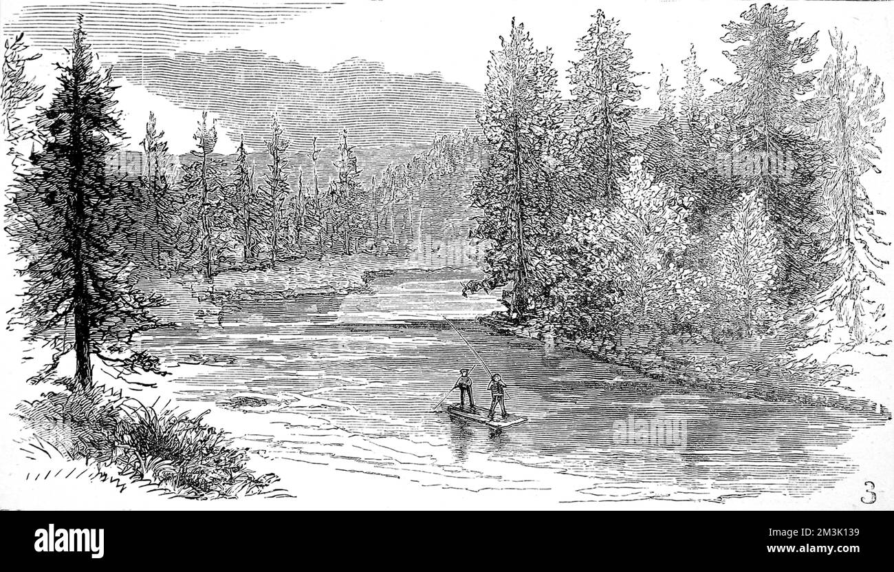 Certains hommes pêchent à la mouche le saumon dans un canoë à Henry's Fork sur la rivière Snake, dans le parc national de Yellowstone. Banque D'Images