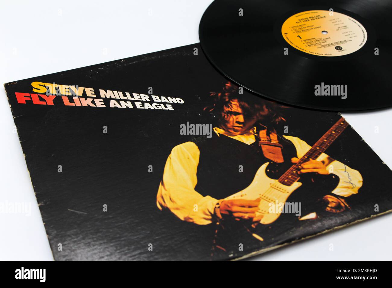 Fly Like an Eagle est le neuvième album studio du groupe de rock américain Steve Miller Band sur disque vinyle LP Banque D'Images