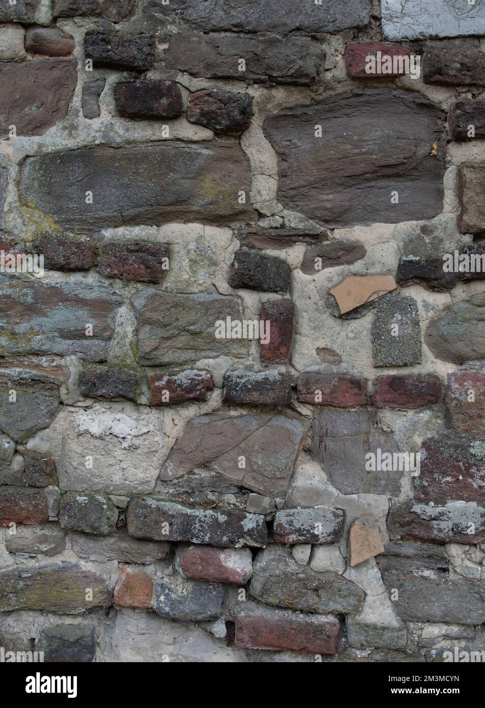 texture d'un vieux mur de pierre. ton gris-marron Banque D'Images