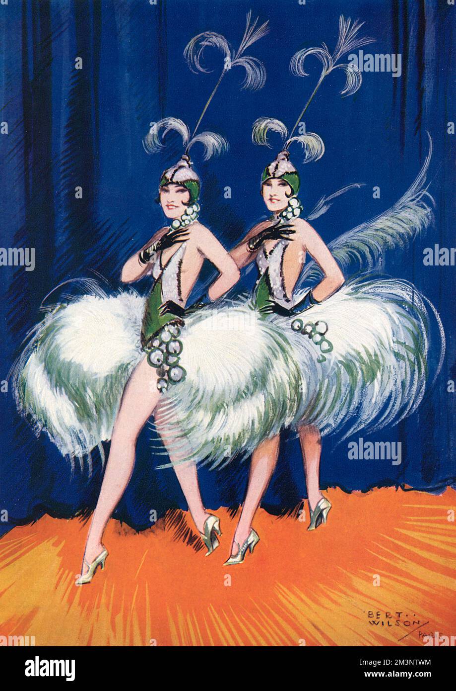 Rosie et Jenny Dolly, artistes de scène les Dolly Sisters photographiés, qui exécutent une routine en costumes à plumes. Date: 1927 Banque D'Images