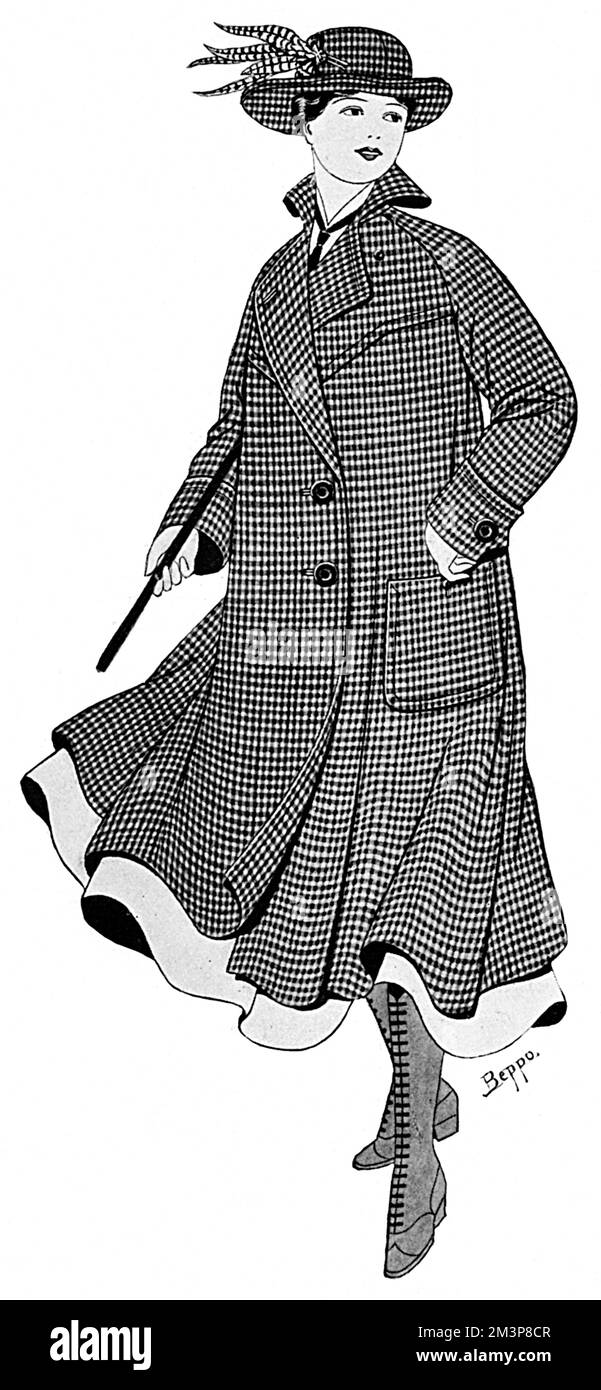 Un élégant sport ou une couche enveloppante de selle marron et blanche tweed avec un surcontrôle de couleur boraret de Burberry's. Date: 1916 Banque D'Images