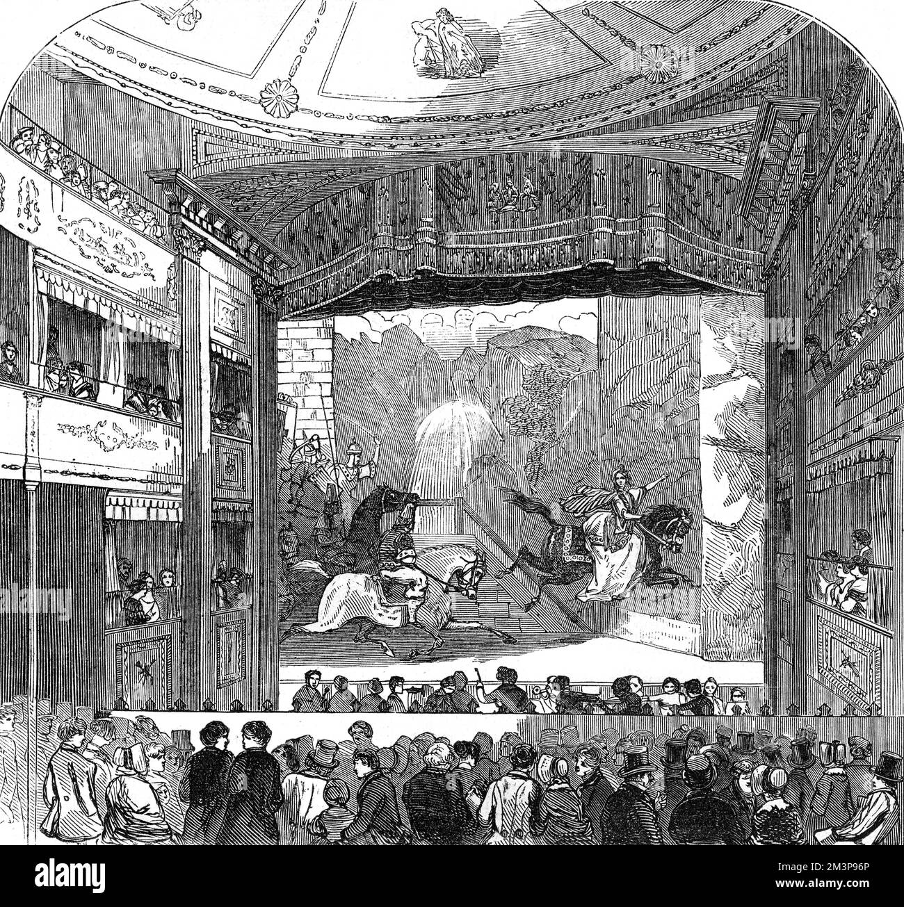 Le New Standard Theatre de Shoreditch, Londres, montrant un spectacle équestre qui a lieu sur scène, l'année où le théâtre a ouvert pour la première fois. La scène représentée ici montre 'la conquête du Tartary, ou l'Aigle Rider de la Circassia, et son Monarch Steed du désert', dans laquelle une performance de Mme R. B Taylor a été très frappante. Banque D'Images