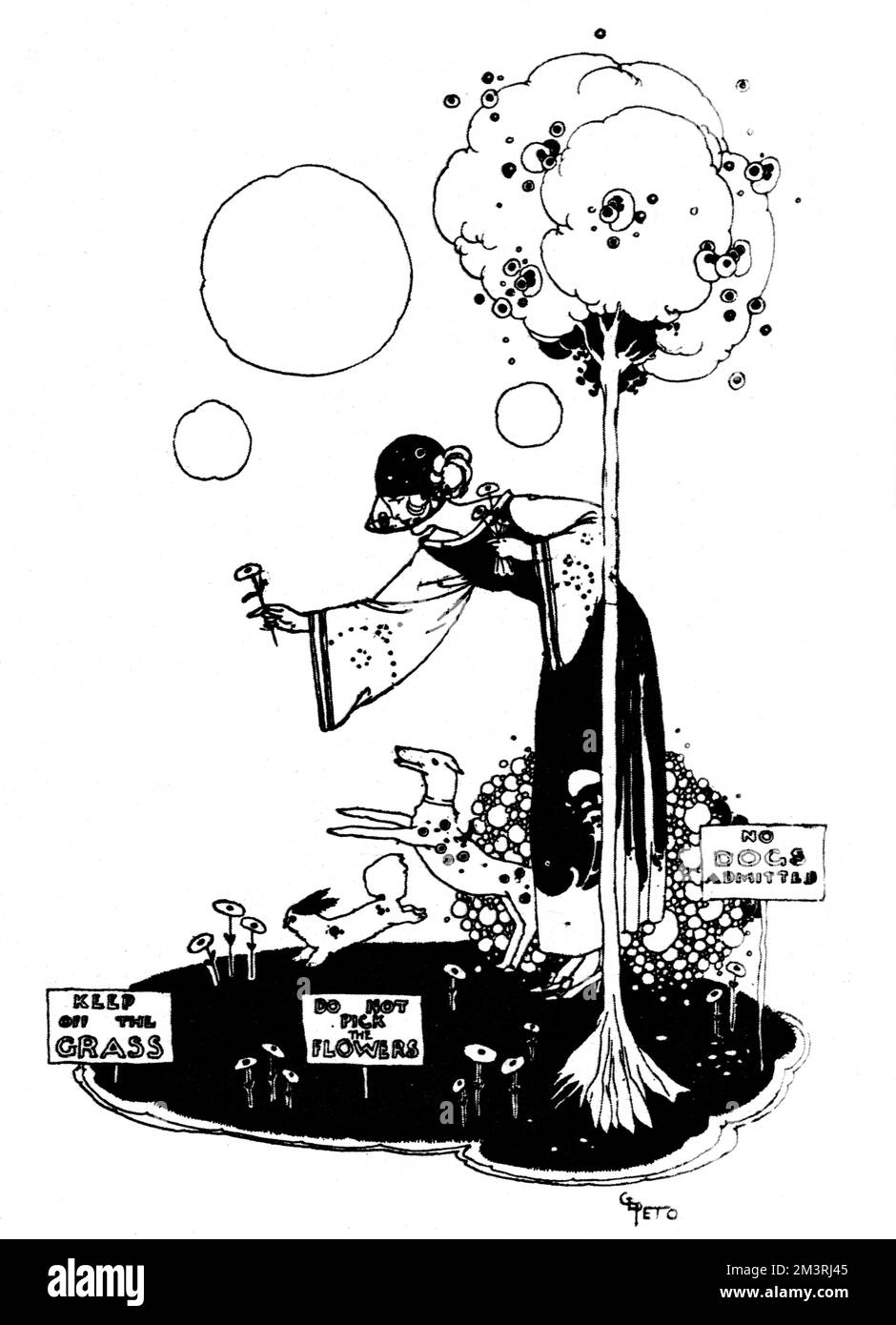 Une jeune dame se tient dans un petit parc, ramasser des fleurs et jouer avec ses chiens. Malheureusement, il est interdit de ramasser des fleurs et les chiens ne sont pas admis dans le parc. Date: 1923 Banque D'Images