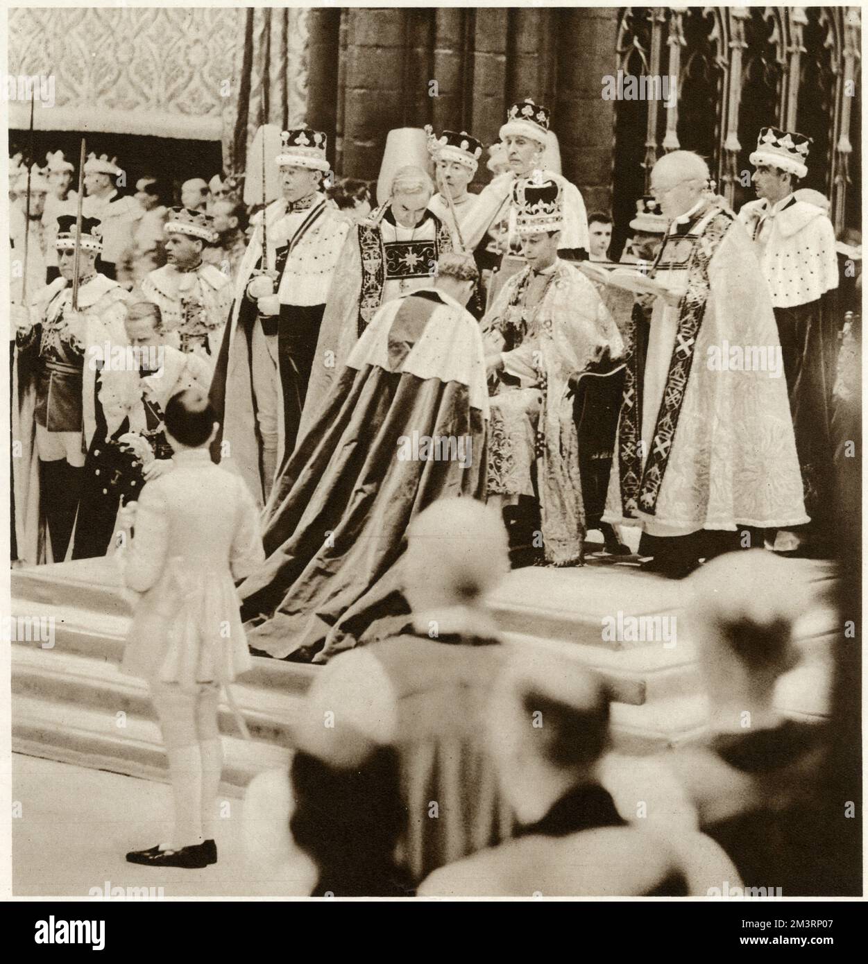 Couronnement du roi George VI et de la reine Elizabeth, exécutant son premier acte comme un roi couronné et inthroné. Recevoir la maison de l'Archevêque et des Evêques. Date : 12 mai 1937 Banque D'Images