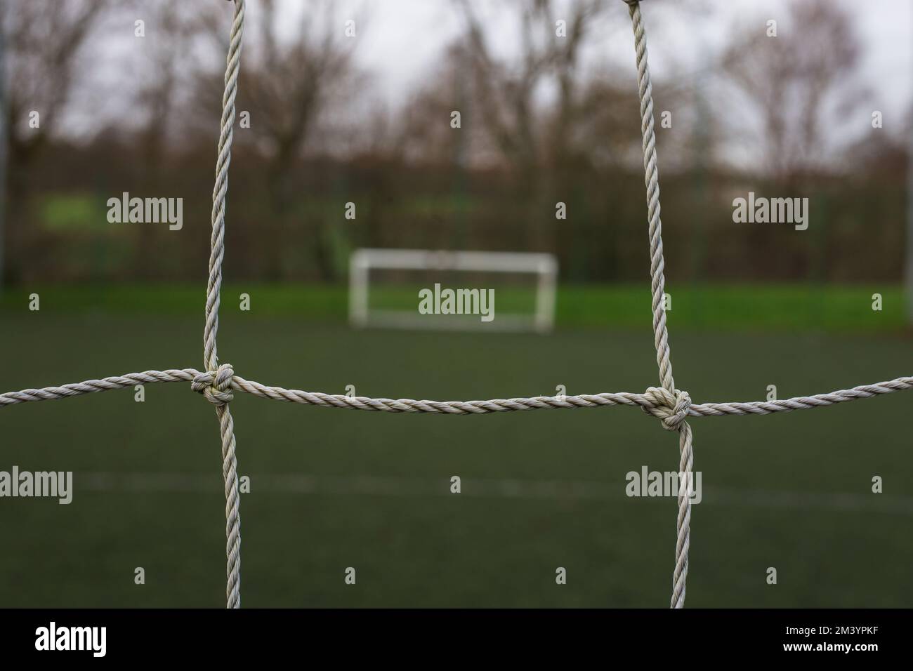 Gros plan d'un but de football et d'un filet Banque D'Images