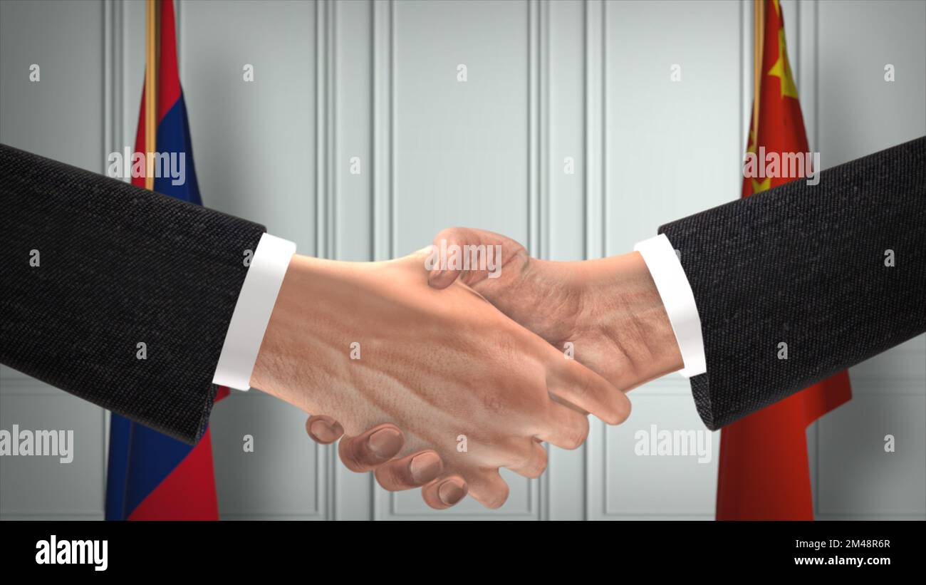 Réunion d'affaires des représentants du Laos et de la Chine. Un accord diplomatique. Partenaires poignée de main. Banque D'Images