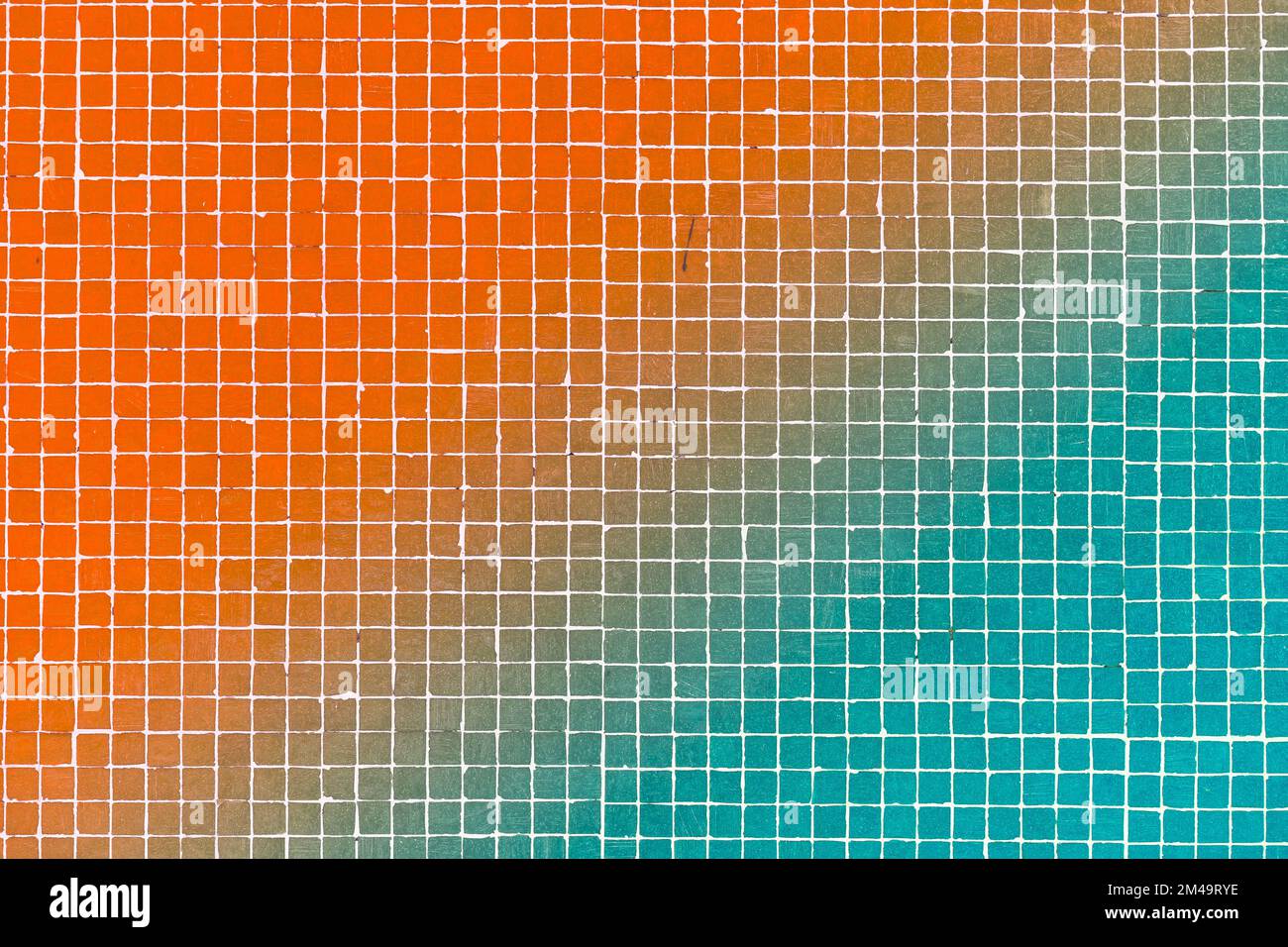 Fond de carreaux de céramique de couleur. Vieux carreaux de céramique vintage en dégradé vert rouge pour décorer la cuisine ou la salle de bains . Photo de haute qualité Banque D'Images