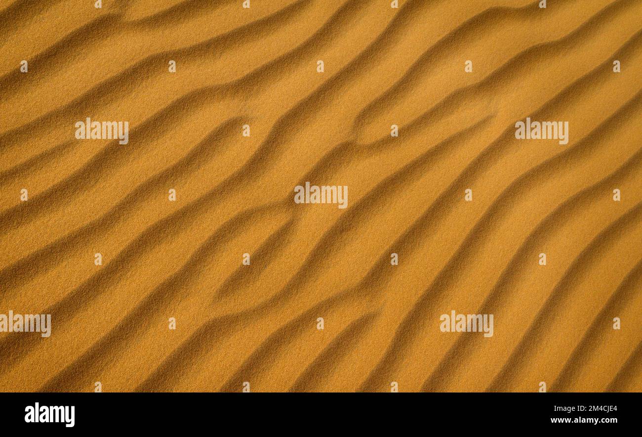 Arrière-plan à motif de sable ondulé doux Banque D'Images