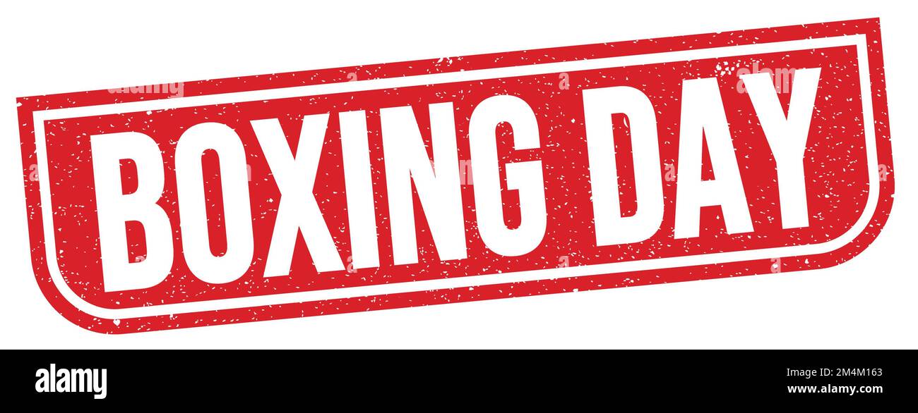 Le texte DU LENDEMAIN DE NOËL est inscrit sur l'affiche rouge du timbre grungy. Banque D'Images