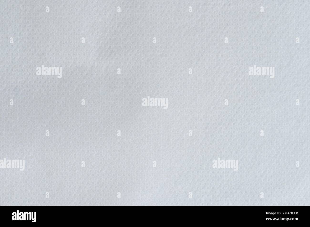 Tissu blanc perforé macro gros plan Banque D'Images