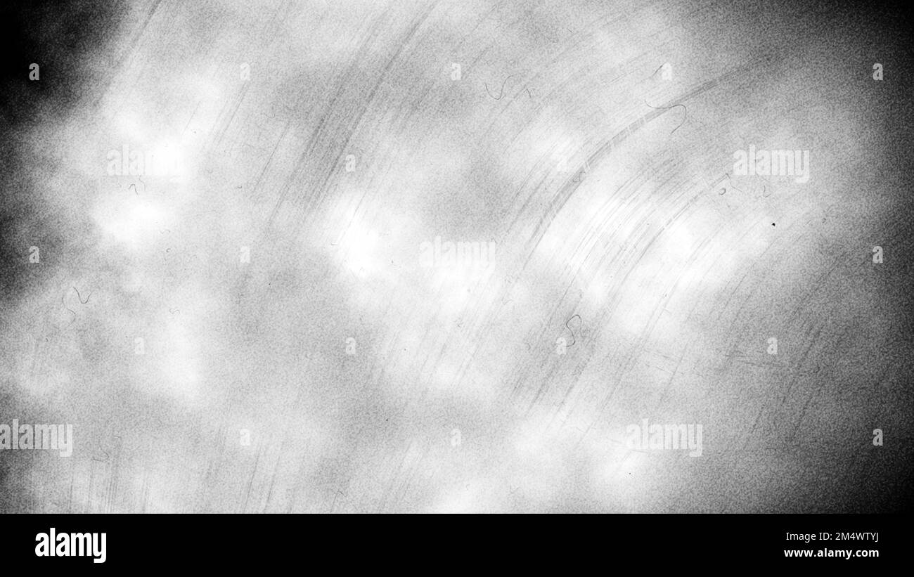 Vintage lumière vieilli vieux photo poussière, taches, rayures et film grain texture de fond recouvrement avec bordure de vignette. Sale grunge noir a Banque D'Images