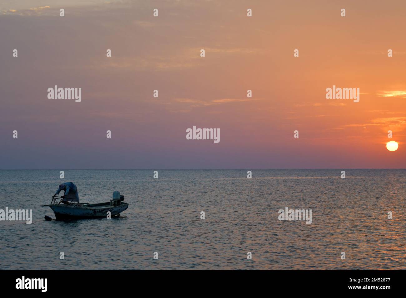 Coucher de soleil et lever de soleil sur la plage Banque D'Images