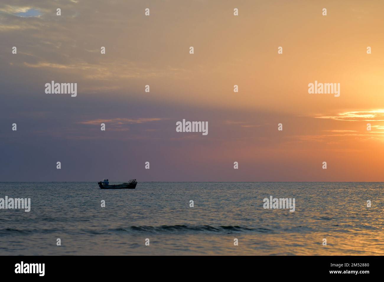 Coucher de soleil et lever de soleil sur la plage Banque D'Images