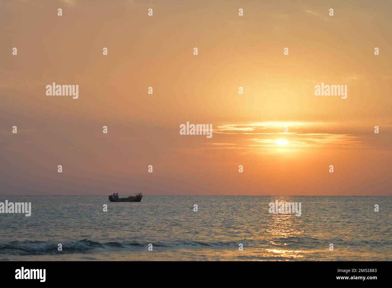 Coucher de soleil et lever de soleil sur la plage Banque D'Images