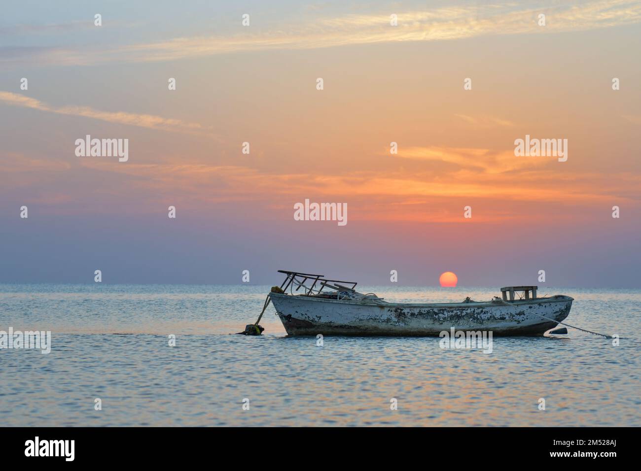Coucher de soleil et lever de soleil sur la plage Banque D'Images