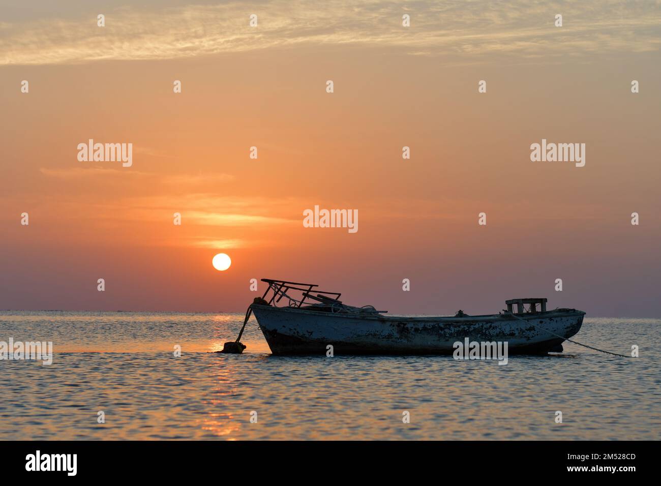 Coucher de soleil et lever de soleil sur la plage Banque D'Images