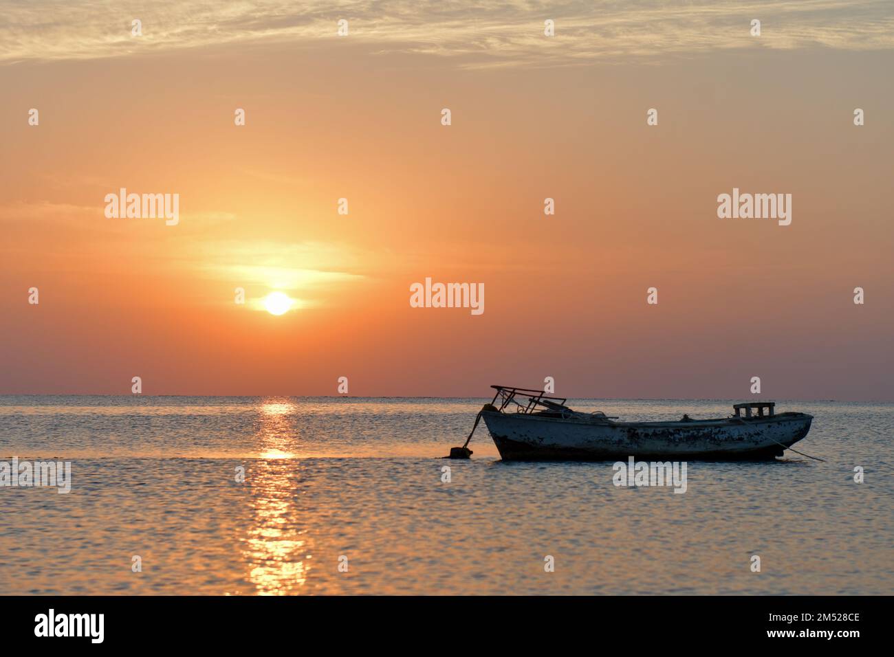 Coucher de soleil et lever de soleil sur la plage Banque D'Images