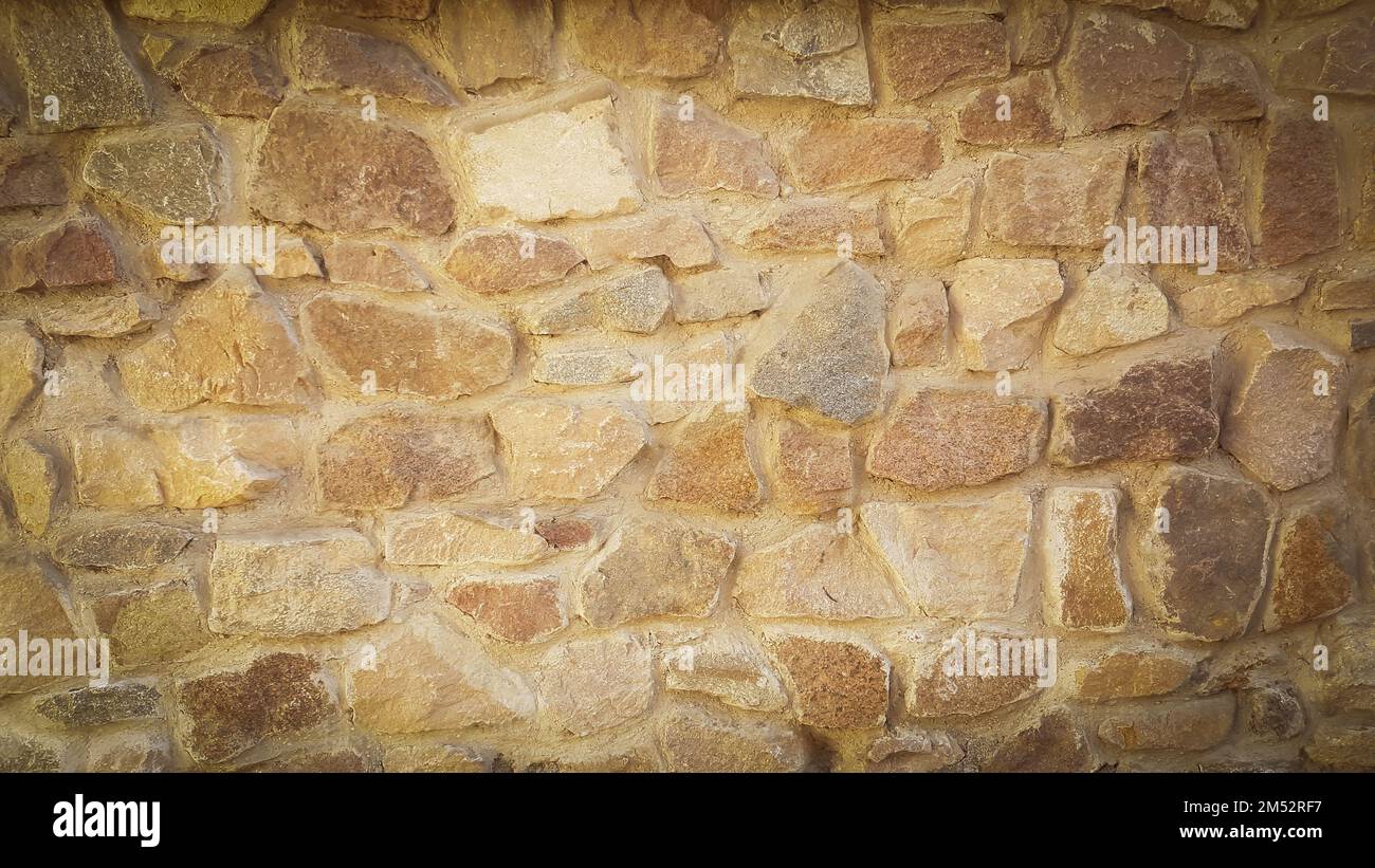 gros plan. fragment d'un mur en pierre. Banque D'Images
