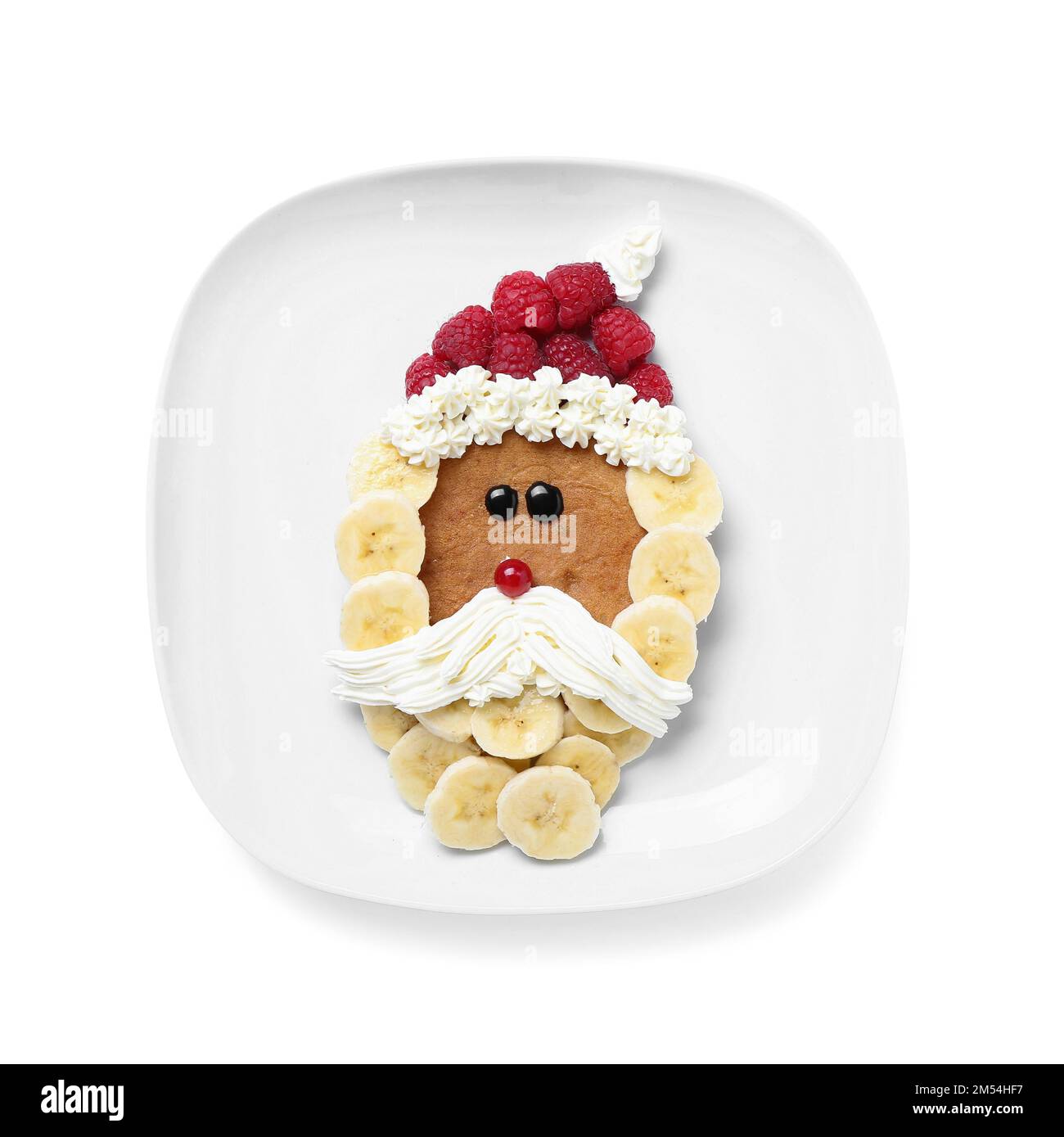 Assiette avec Père Noël en crêpe, fruits et crème fouettée sur fond blanc  Photo Stock - Alamy