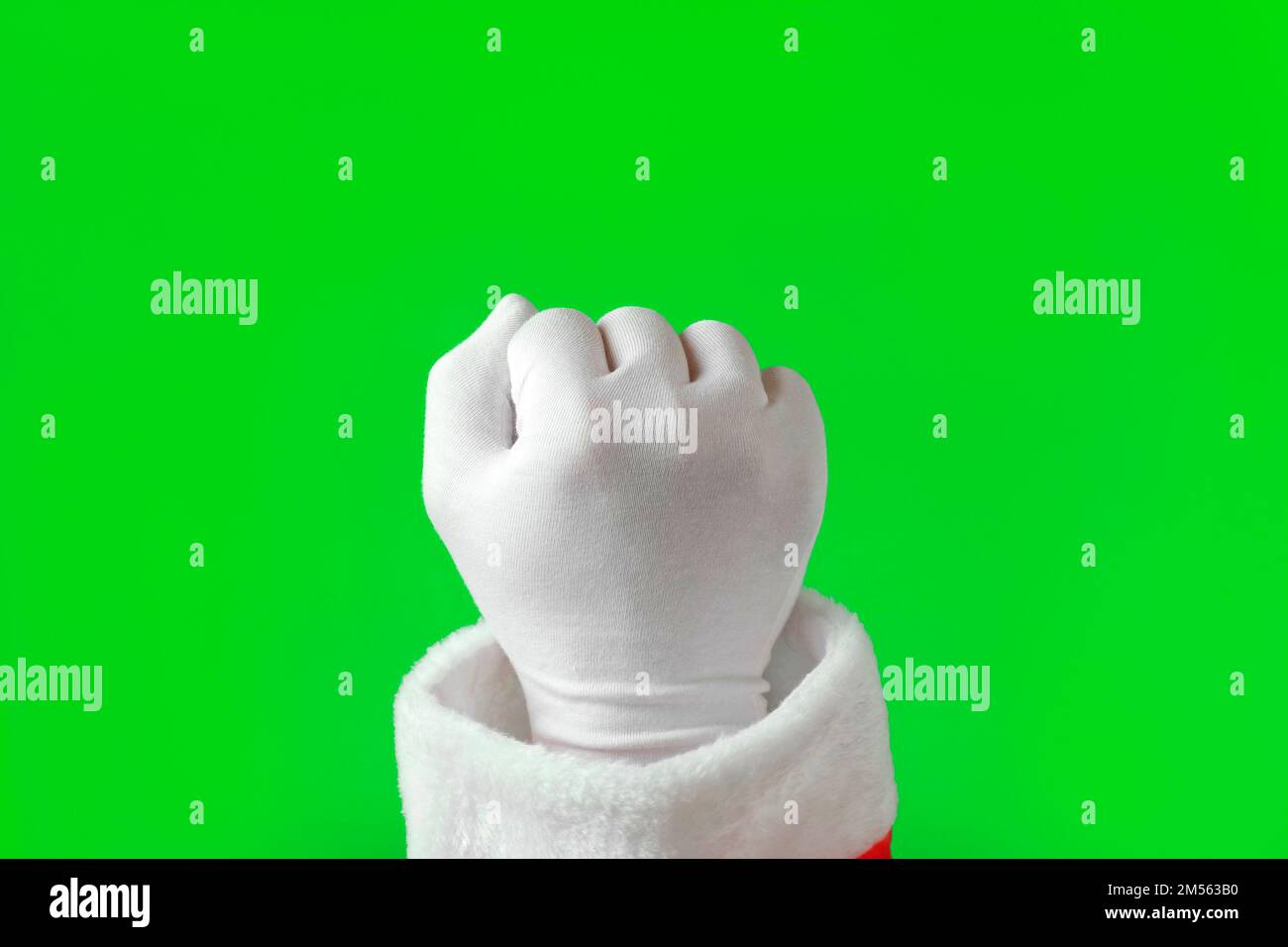 Pack gestes. Main du Père Noël en blanc gants de cognement isolés sur fond d'écran vert Chroma Key. Santa Fist gestuelle Knock Knock Knock Knock Knock. Les vacances Banque D'Images