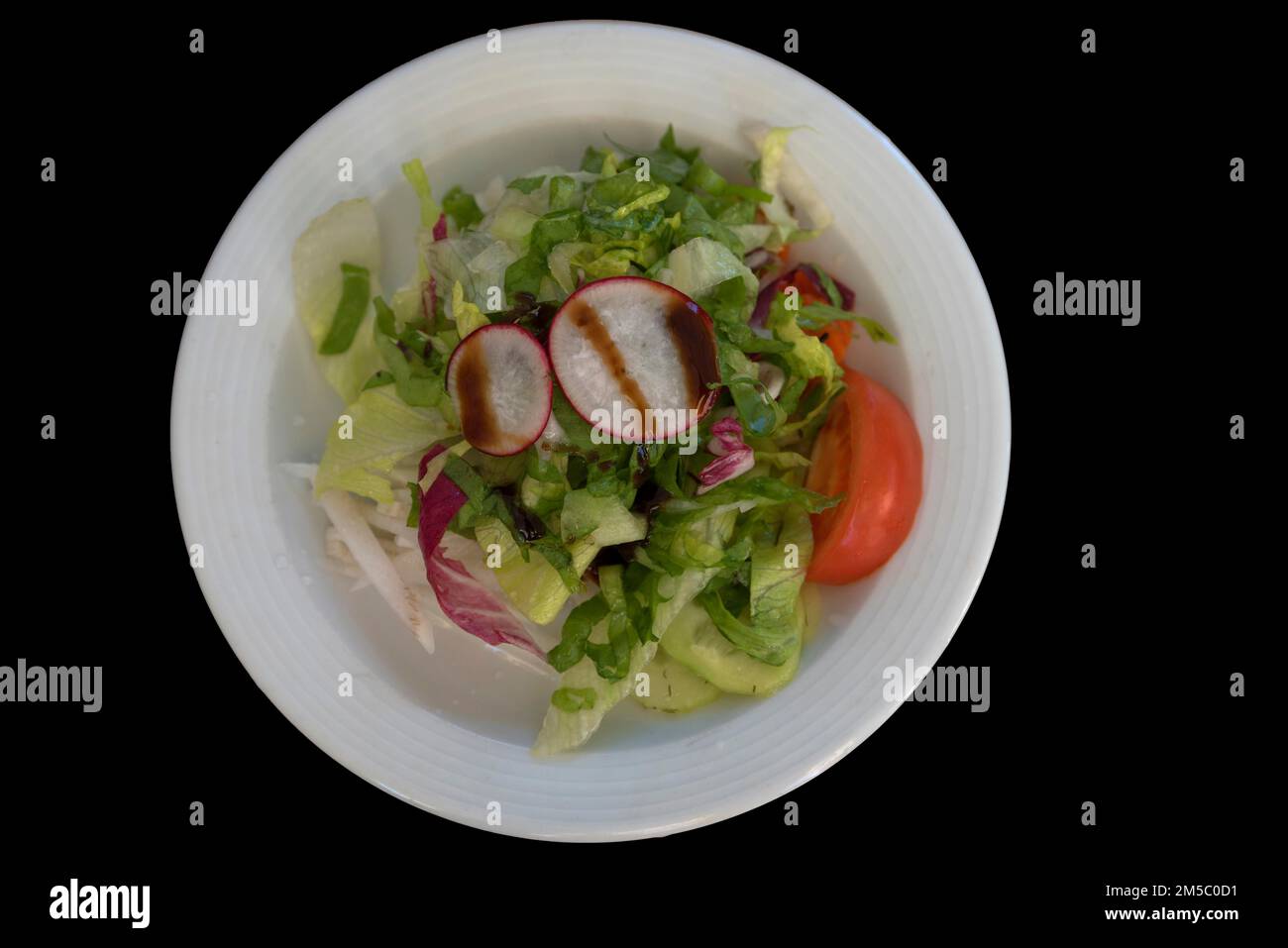 Salade mixte sur sol noir, Bavière, Allemagne Banque D'Images