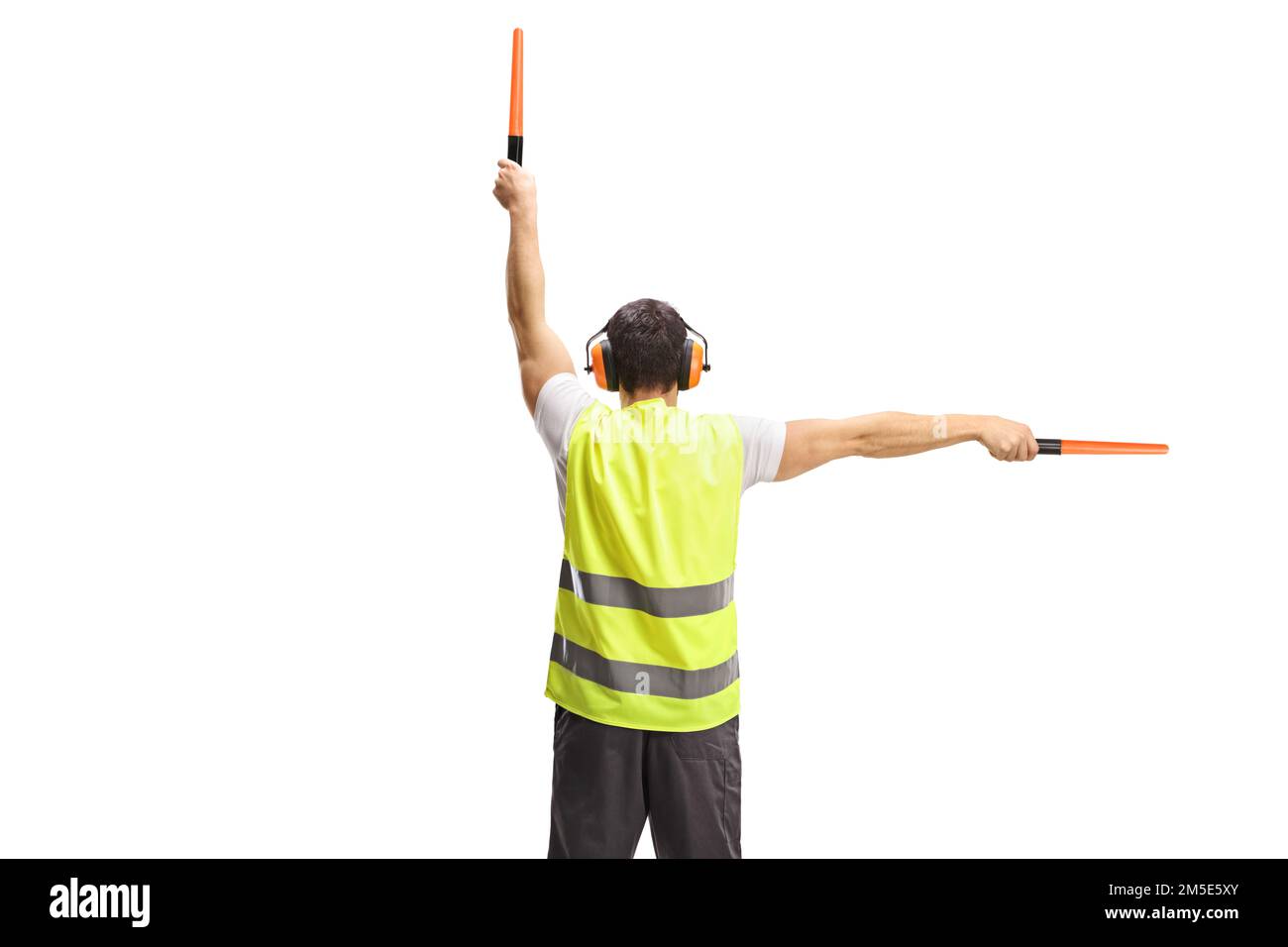 Vue arrière d'un signal de marshaler d'avion avec des baguettes isolées sur fond blanc Banque D'Images
