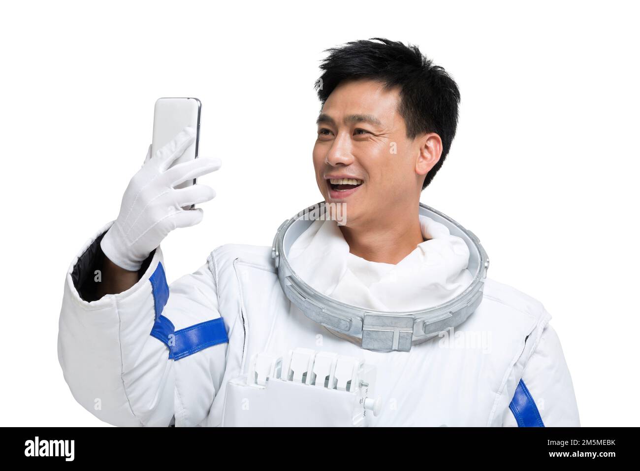 Les astronautes de l'abri affichent un téléphone portable Banque D'Images