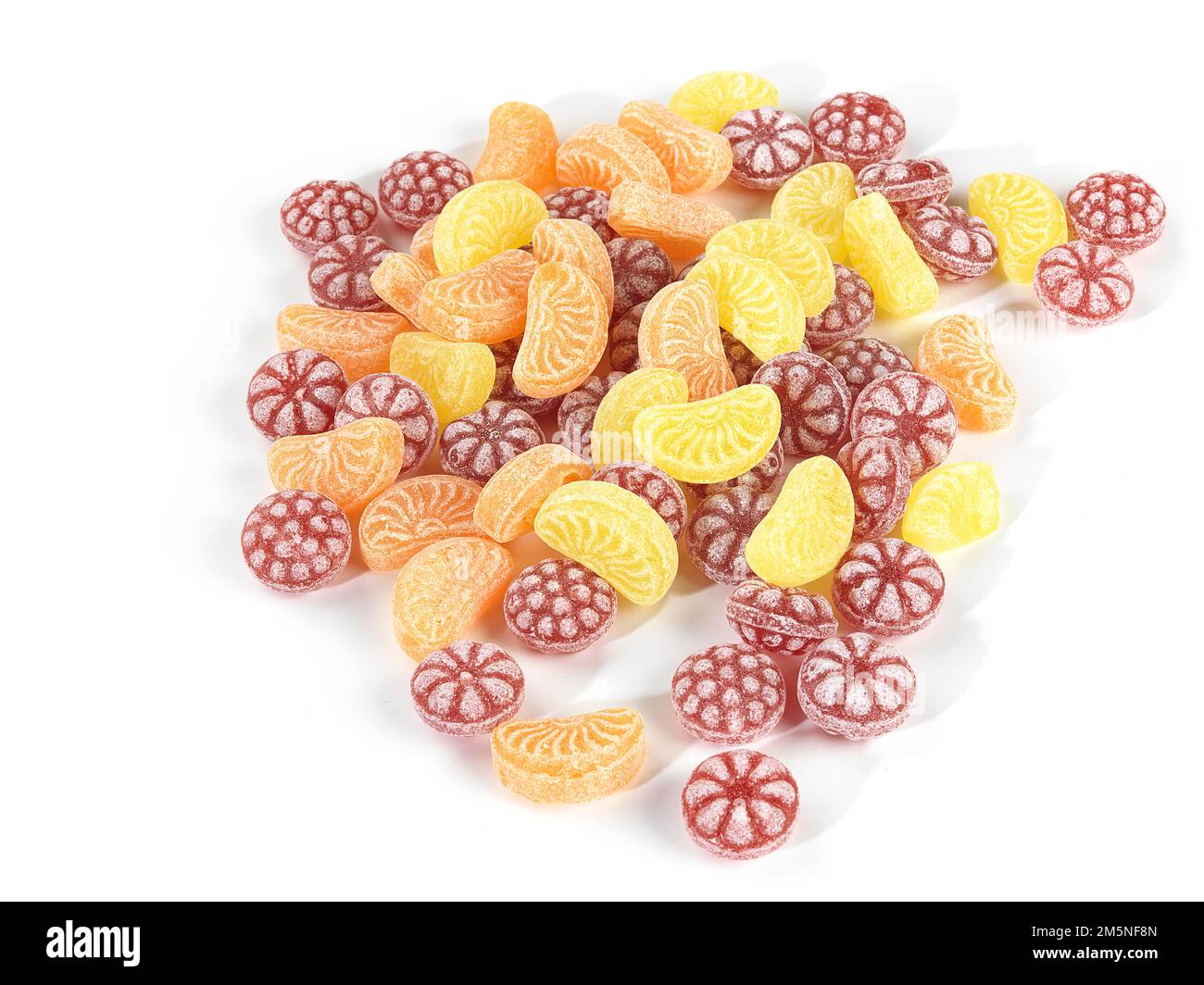 Bonbons colorés, citron, orange, cerise noire Banque D'Images