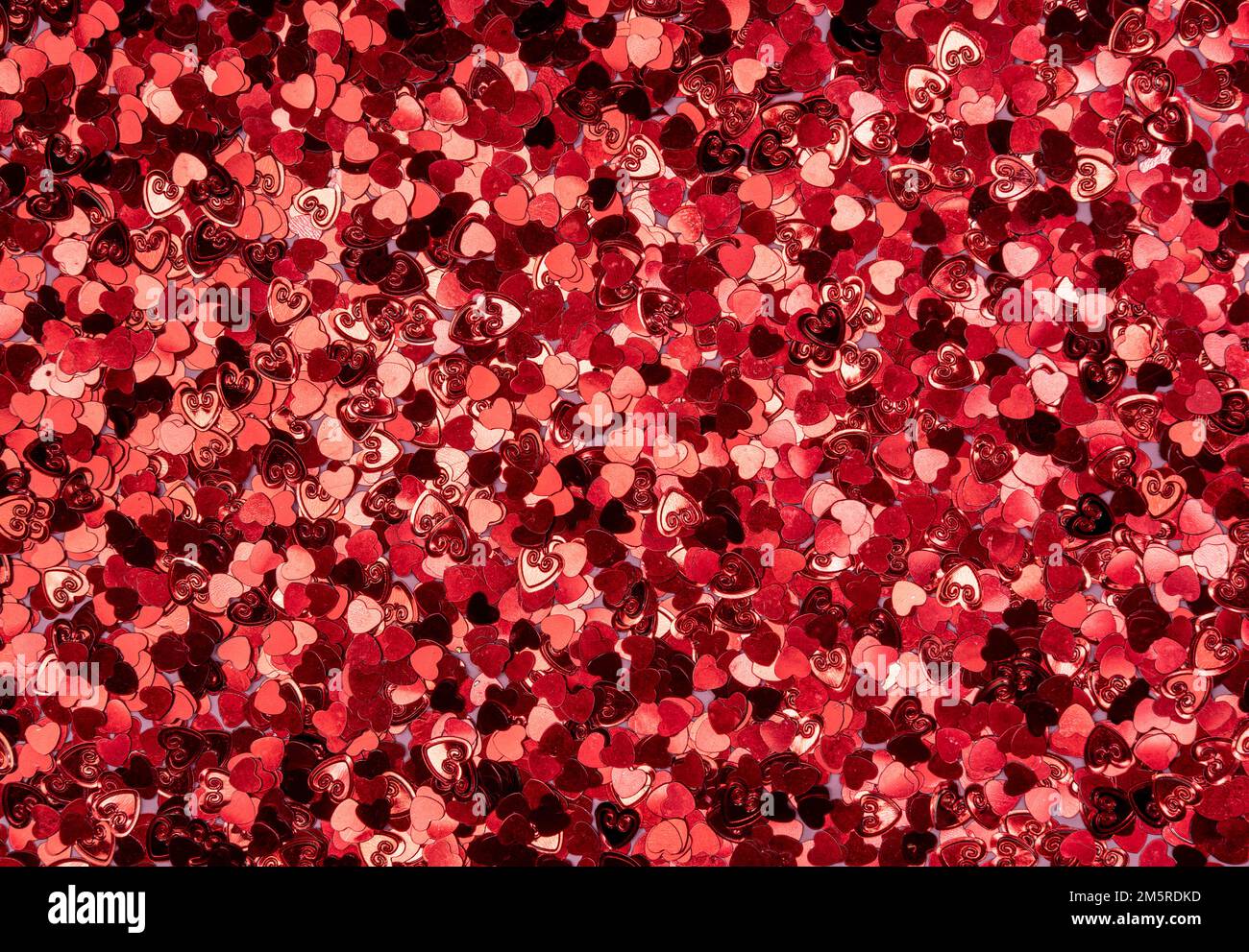 Contexte de la Saint-Valentin. Coeurs rouges scintillants Banque D'Images