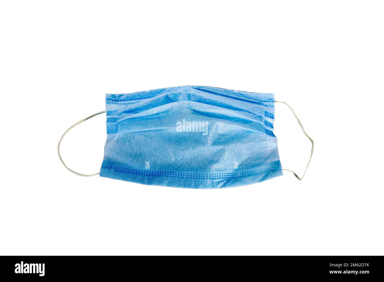 Masque de protection médical sur fond blanc, vue de dessus. Soins de santé. Banque D'Images