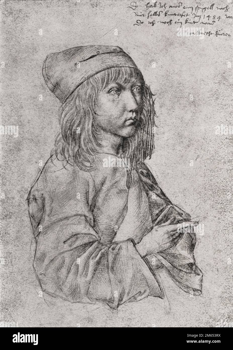 Autoportrait d'Albrecht Dürer, 1471 – 1528. L'inscription dans le coin supérieur droit se lit comme suit : « J'ai tiré ça après moi d'un miroir en 1484, alors que j'étais encore enfant. » Peintre allemand, graveur et théoricien de la Renaissance allemande. De Albrecht Dürer, Sein Leben und eine Auswahl seiner Werke ou sa vie et une sélection de ses œuvres, publié en 1928. Banque D'Images