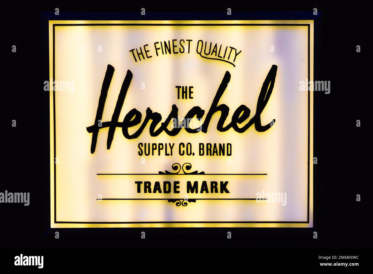 Panneau lumineux de Herschel Supply Co. Marque. L'entreprise est un fabricant de sacs à dos, sacs et accessoires de voyage de qualité supérieure, conçu pour la conception Banque D'Images