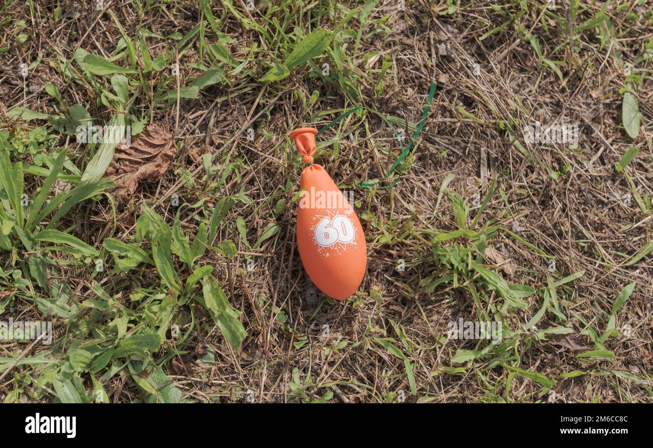 Ballon dégonflé après avoir fêté les 60 ans Banque D'Images