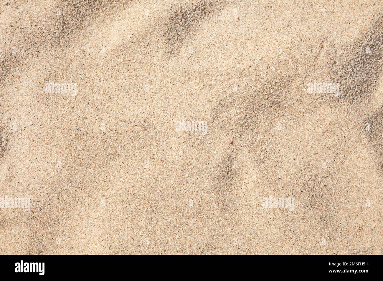 Sable sur le fond de la plage Banque D'Images