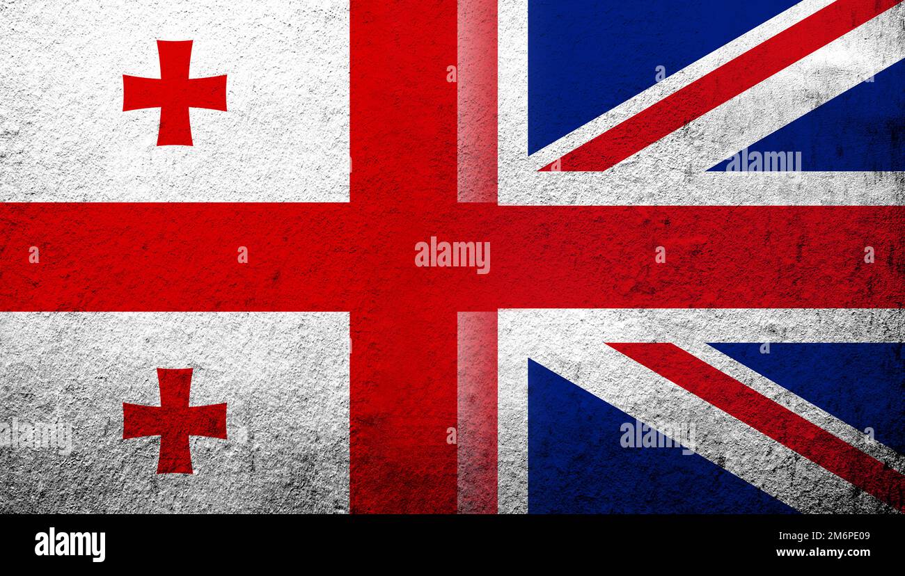 Drapeau national du Royaume-Uni (Grande-Bretagne) Union Jack avec le drapeau national cinq étoiles du pays de la Géorgie. Grunge ba Banque D'Images