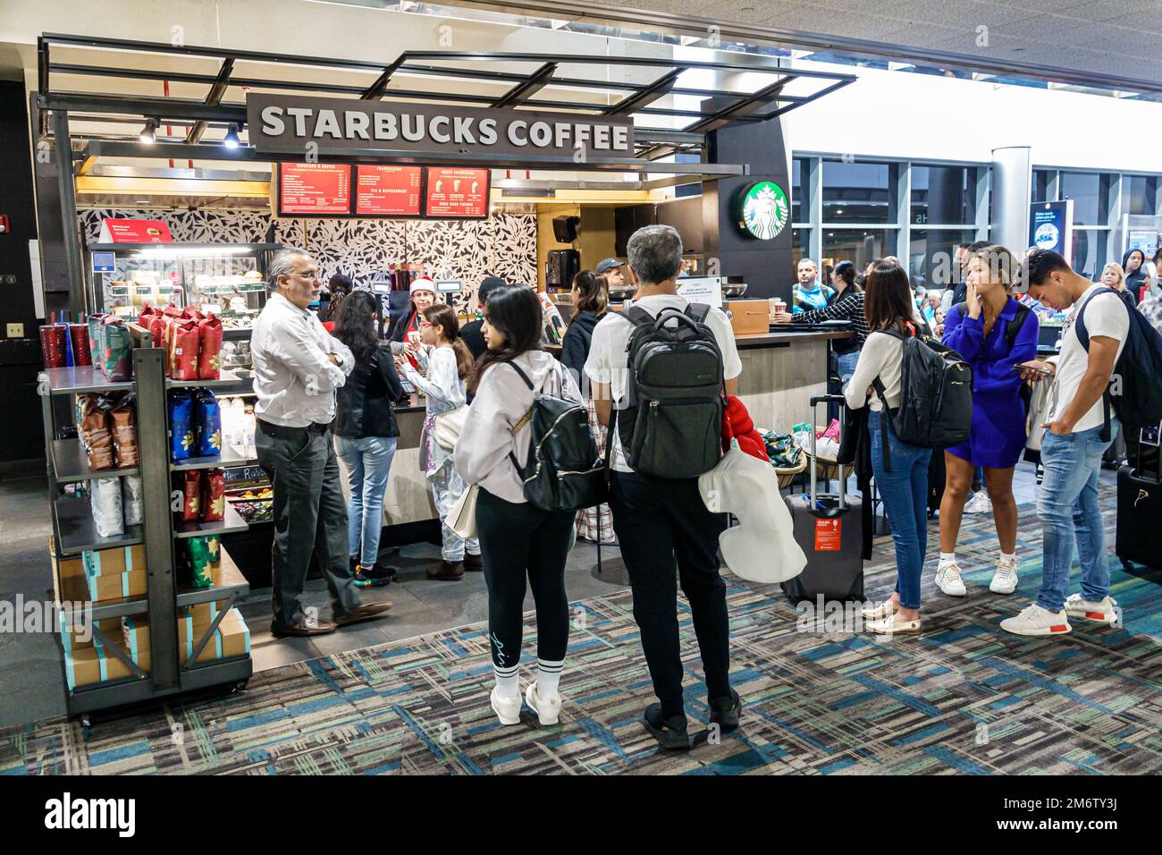 Miami Florida, aéroport international de MIA, zone de la porte du terminal, baristas Starbucks Coffee Barista, États-Unis États-Unis Amérique, Amérique du Nord AMO Banque D'Images