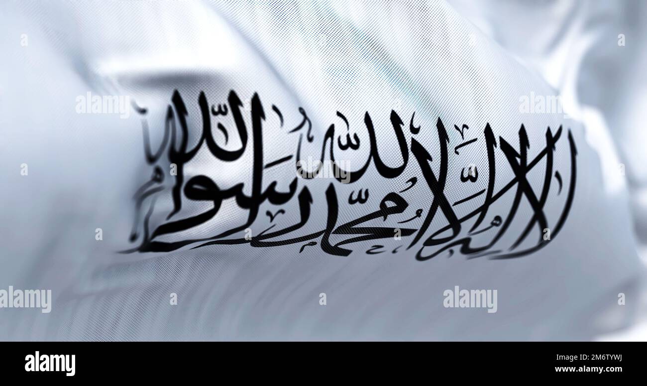 Le drapeau de l'émirat islamique d'Afghanistan qui agite dans le vent. Banque D'Images