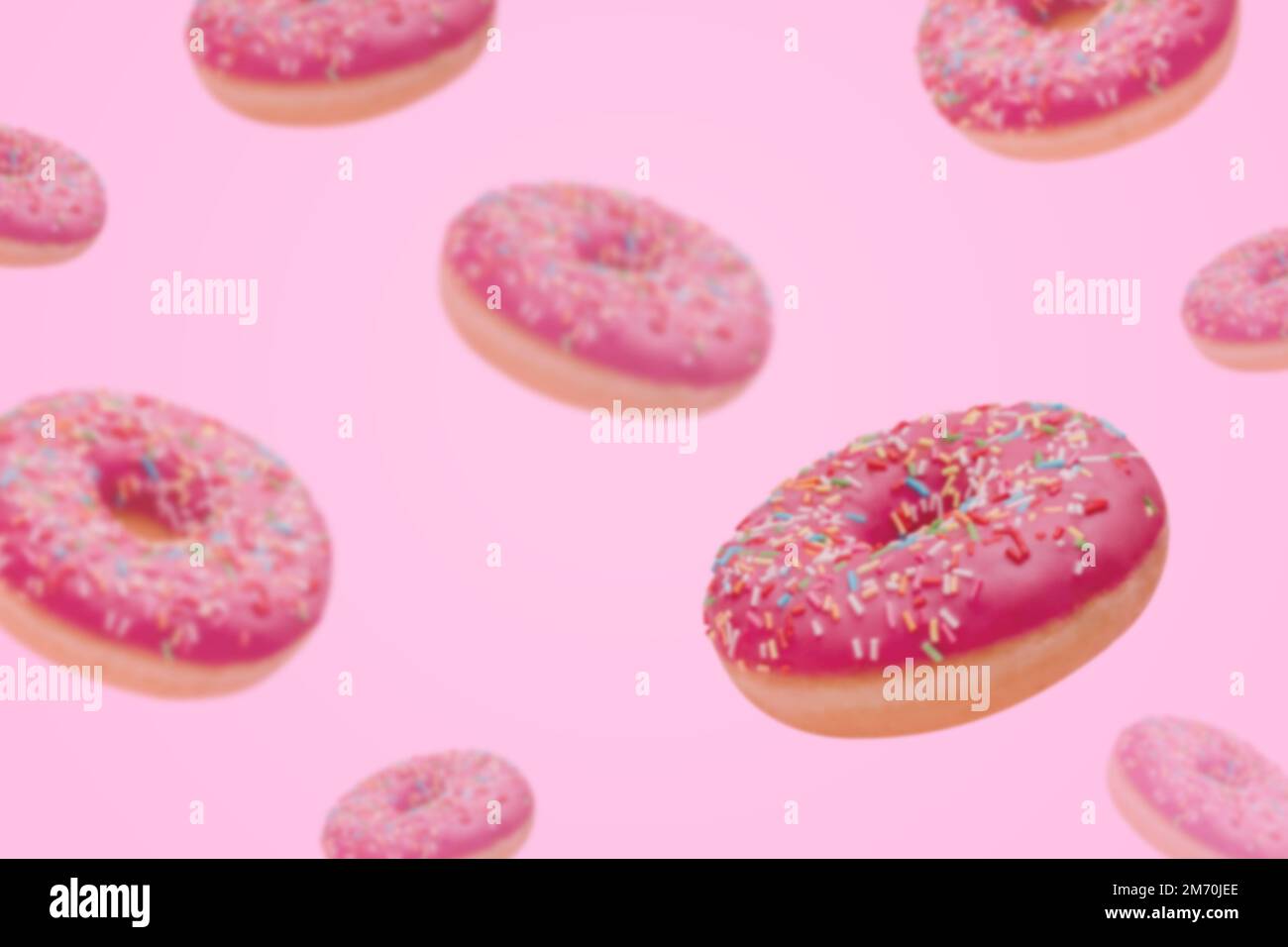 Scène de beignes volantes. Arrière-plan abstrait défoqué. Beignets de glace roses avec des saupoudres colorées sur fond violet clair Banque D'Images