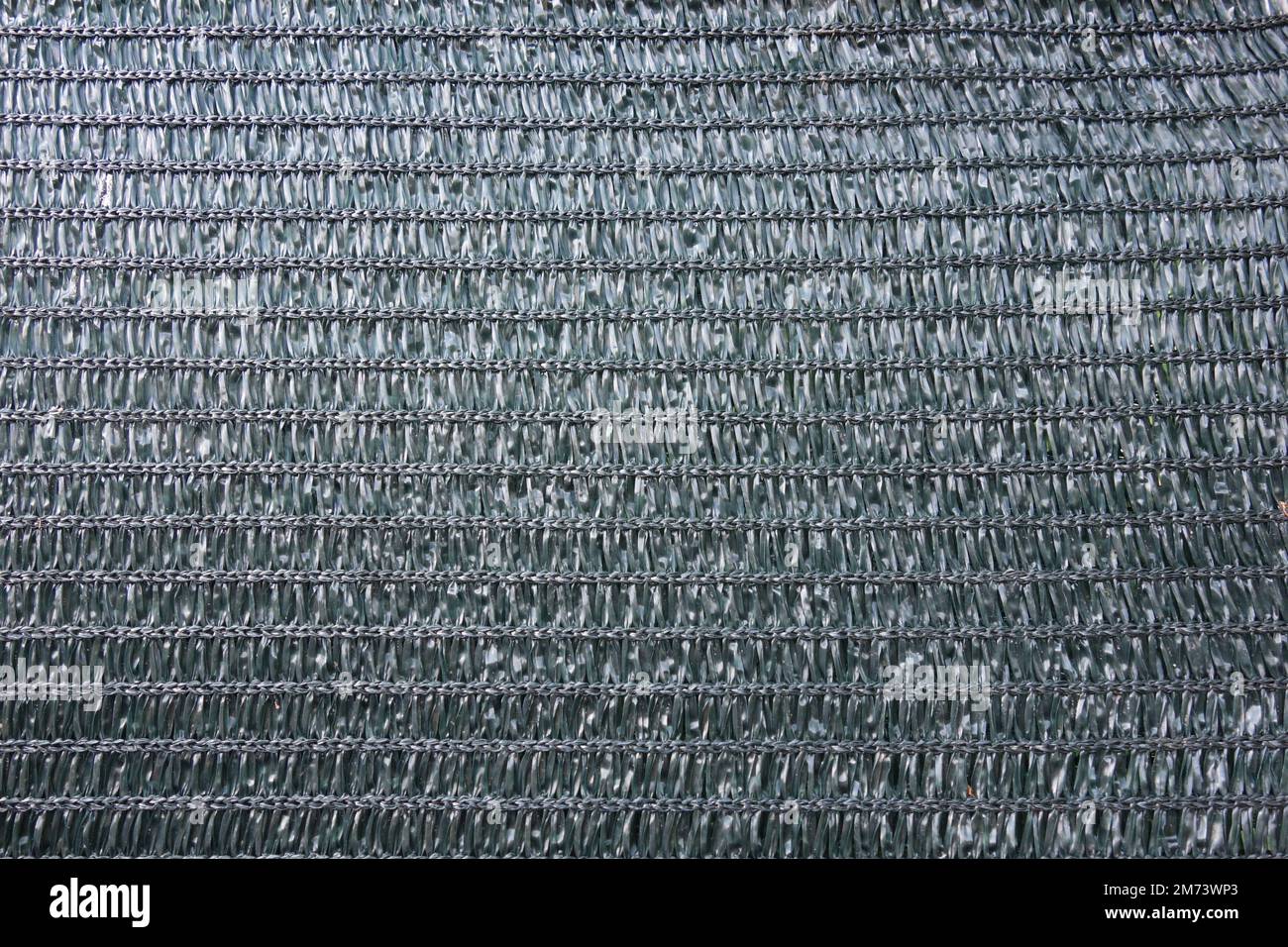 Ecran de confidentialité pour clôtures en maille de polyester recouvert de vinyle Banque D'Images