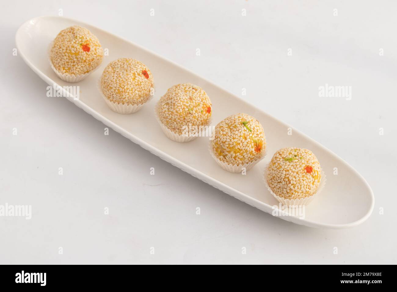 Saison d'hiver spécial Punjabi traditionnel Mithai jusqu'à Bhugga ou Til Bugga est fait de graines de sésame grillées à sec avec Mava, Khoya, Jaggery, Mawa, gord, Des Banque D'Images