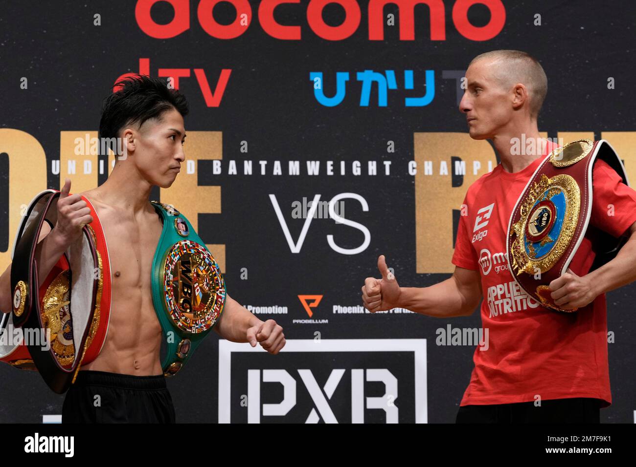 Japan's Naoya Inoue, left, and Britain's Paul Butler pose for a photo after a weigh-in, ahead of Tuesday's bantamweight title unification boxing match of WBA, WBC, IBF, WBO in Yokohama, Monday, Dec. 12, 2022.(AP Photo/Shuji Kajiyama) Banque D'Images