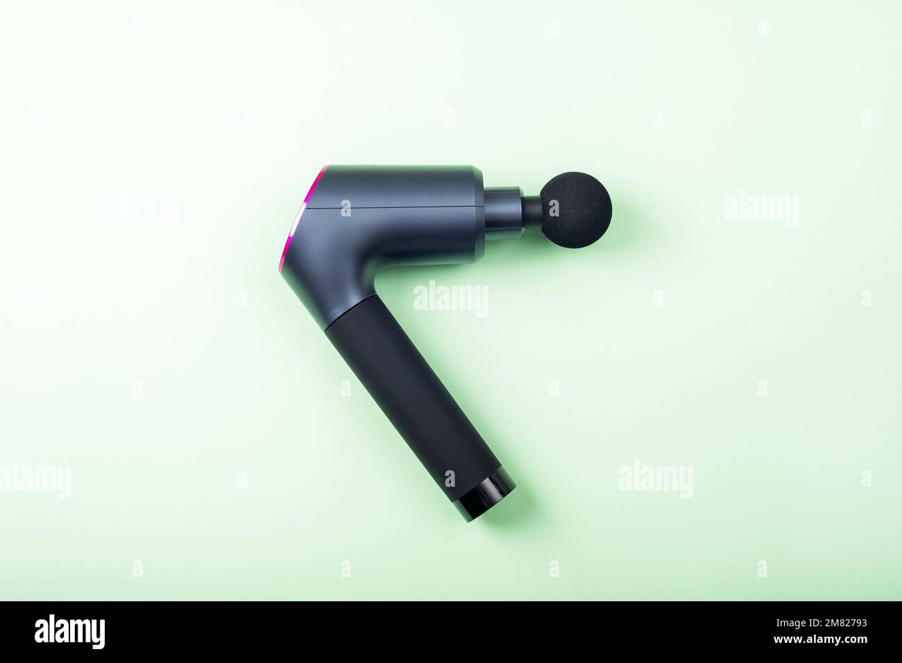 Pistolet de massage, sans fil portable percussions professionnel tissu profond corps massage fascia pour les athlètes. Banque D'Images