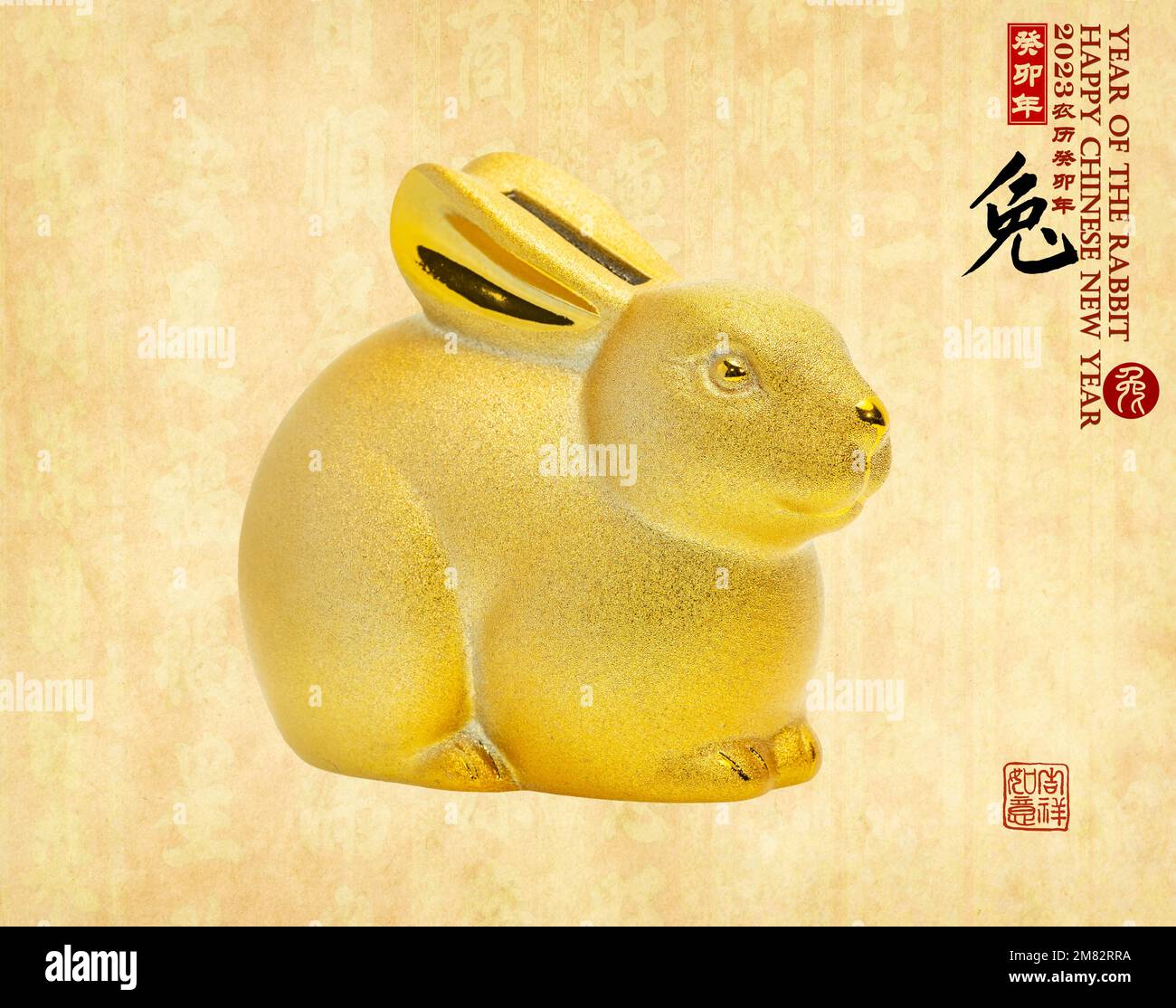 Tradition chinoise Golden Rabbit statue,2023 est l'année du lapin,traduction des caractères chinois: 'Lapin'.partie droite du texte et du sceau mean:Chinese cal Banque D'Images