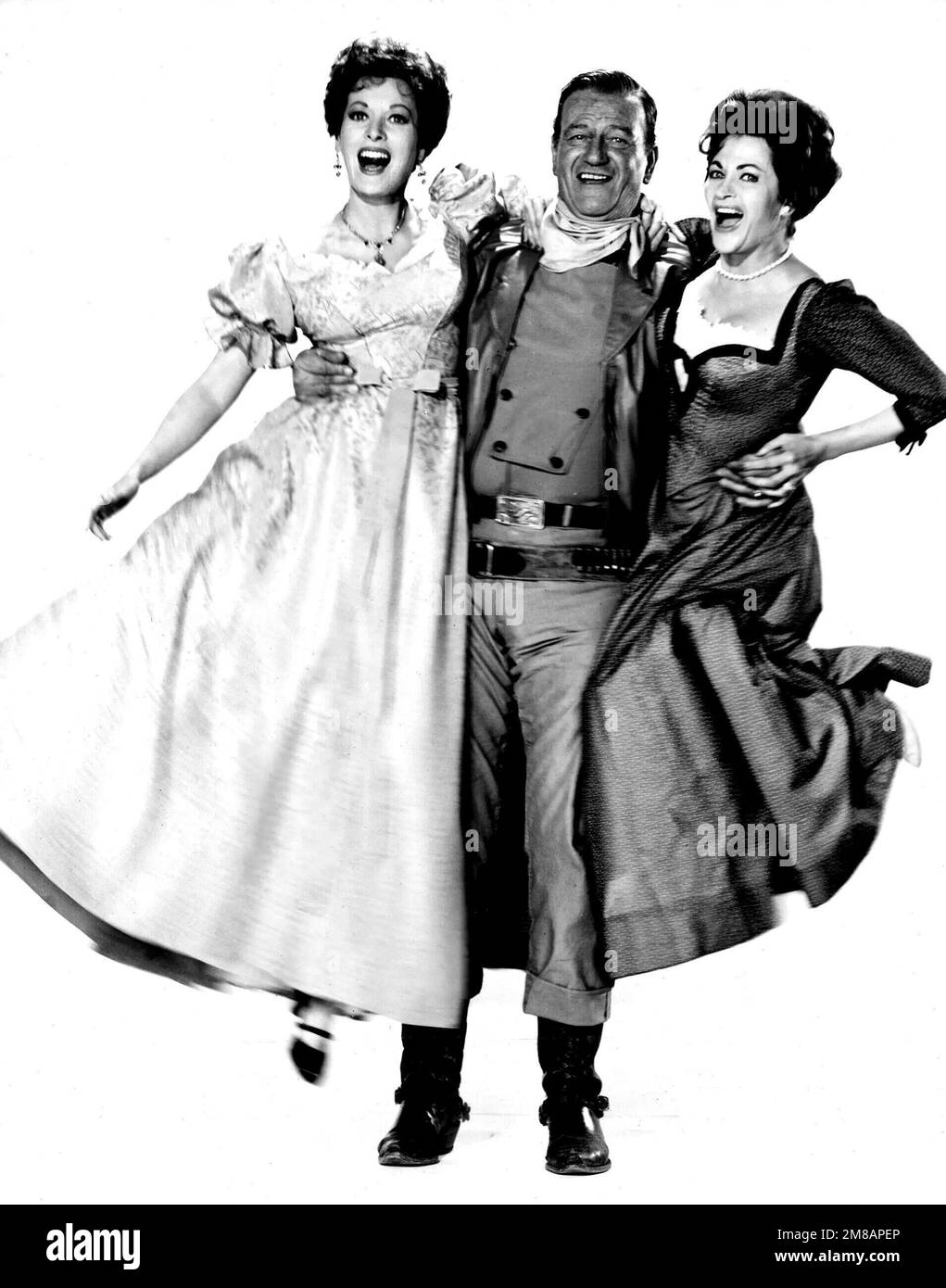 MAUREEN O'HARA, JOHN WAYNE ET YVONNE DE CARLO À MCLINTOCK! (1963), dirigé par ANDREW V. MCLAGLEN. Crédit: ARTISTES UNIS / Album Banque D'Images