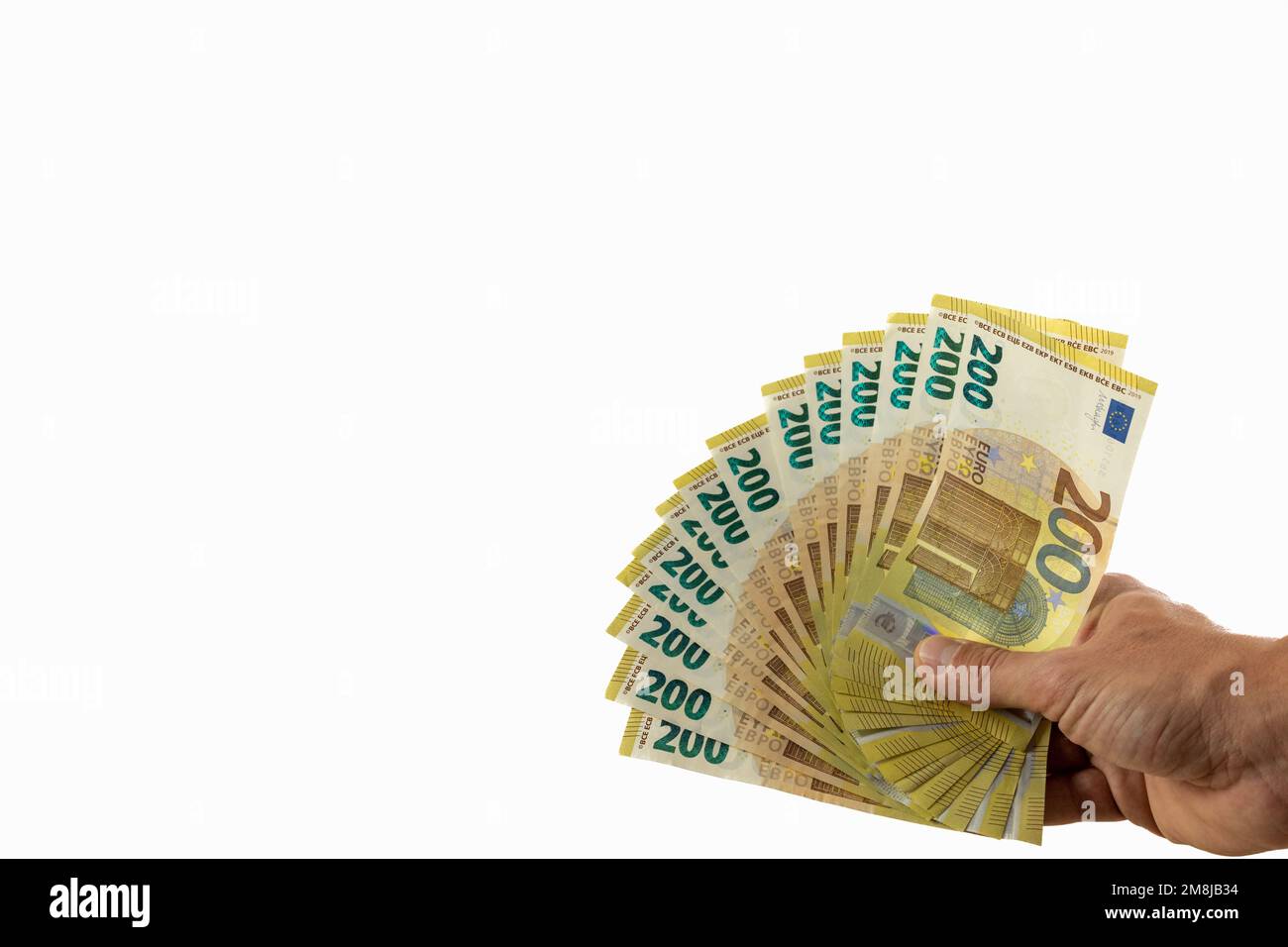 Un gros plan des mains avec des billets en euros sur fond blanc Banque D'Images