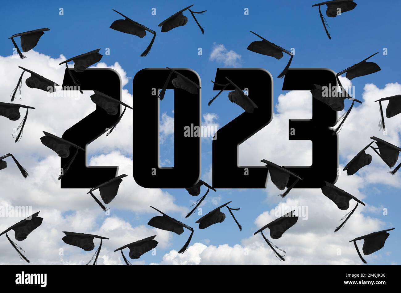 Capsules de graduation noires aéroportées dans le ciel avec texte noir 2023 Banque D'Images Capsules de graduation noires aéroportées dans le ciel avec texte noir 2023 Banque D'Images