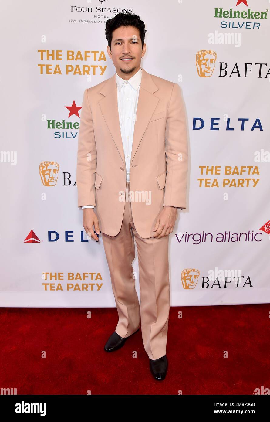Danny Ramirez arrives at the 2023 BAFTA Tea Party, Saturday, Jan. 14, 2023, at the Four Seasons Hotel Los Angeles at Beverly Hills, in Los Angeles. (Photo by Jordan Strauss/Invision/AP) Banque D'Images